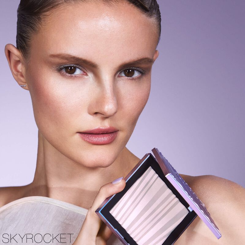 nars بودرة الوجه والجسم aura illuminating