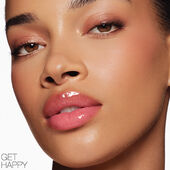 nars afterglow lip shine get happy