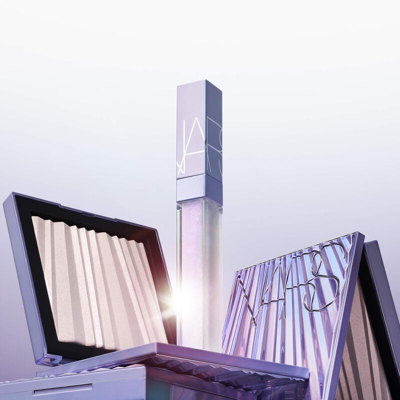 nars بودرة الوجه والجسم aura illuminating